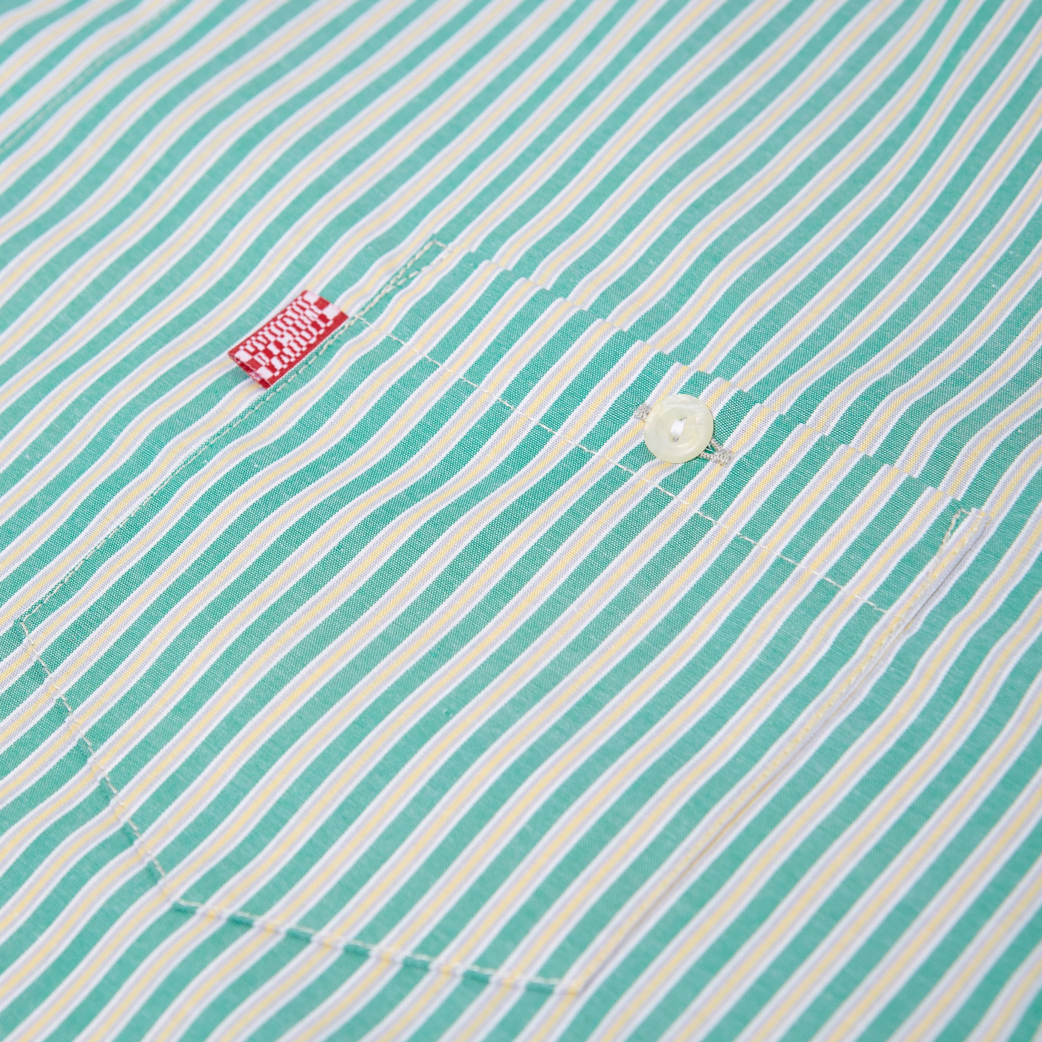 striped label shirt (green)